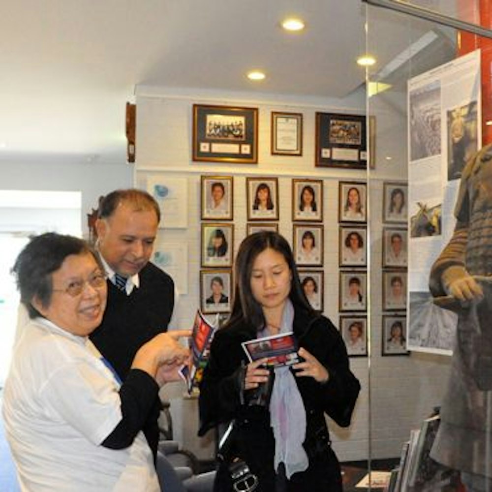 Grace Wang from Chen Jing Lun High School and Anita Chong from Mount Lawley SHS viewing the "General"