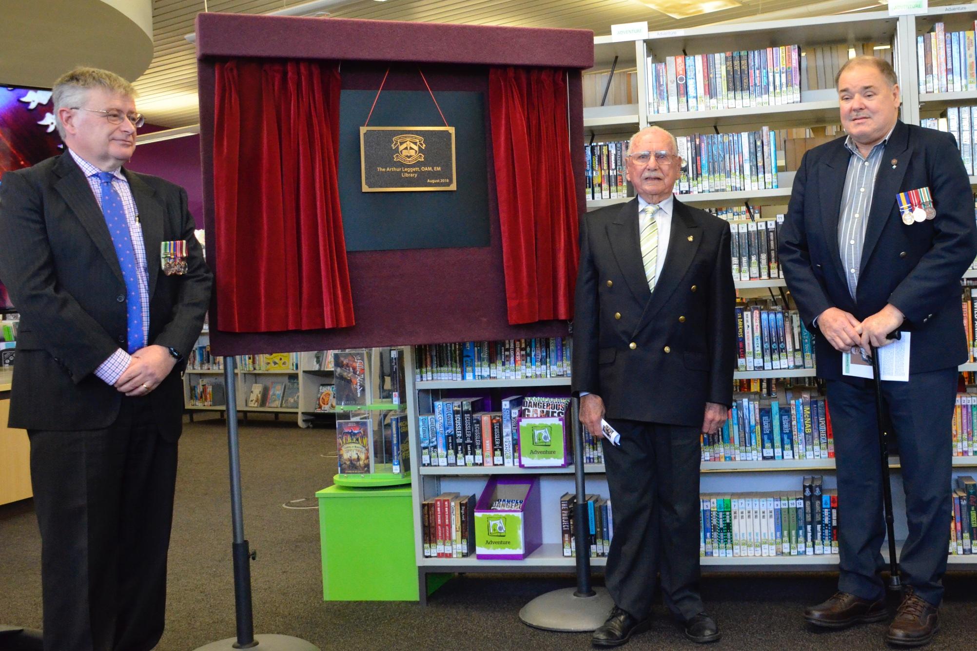 Mr Leggett (centre) unveiling the plaque with (left) Mr Milton Butcher substantive Principal Mount Lawley SHS and Mr Ray Galliott (right) Secretary/treasurer Ex POW Association WA