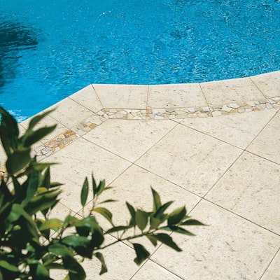 Sandstone Coral Pavers with Yellow Riverstone Sandstone Base