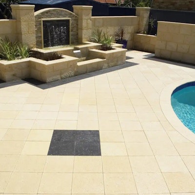Sandstone Coral Pavers, Charcoal Coral Feature and Bullnose