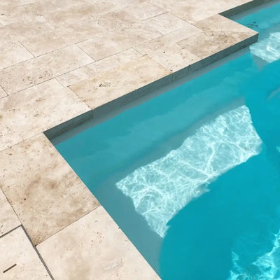 Roma Travertine Paving and Overhanging Lip Pool Capping