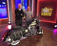 Indian Chief Vintage Auction Winner Tracey Fellows with Channel 9's Simon Bouda on The NRL Footy Show