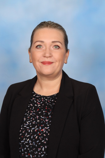 Miss Melanie Caddick