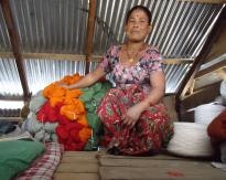 Ganu Lama partnership with husband carpet weaving , dog well products and buffalo enterprises.